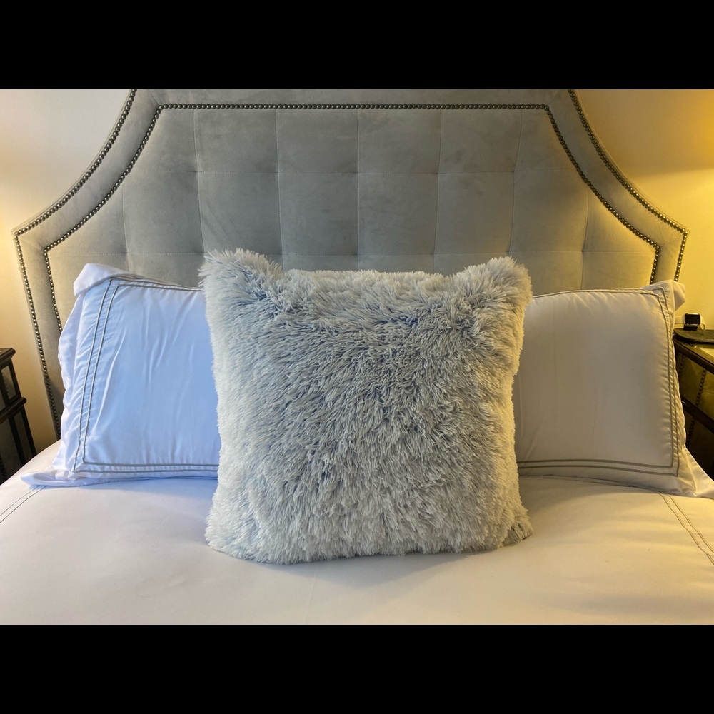NEVER USED - Two white pillows with grey detail and one fuzzy blue pillow